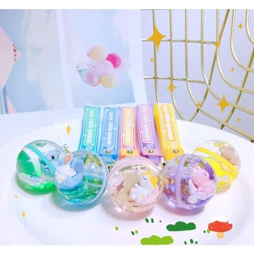 New Fashion Creative Cute Sofa Doll Keychain Trend Oil Floating Quicksand Charm Key Chain Girl Cute School Bag Gift Keychain