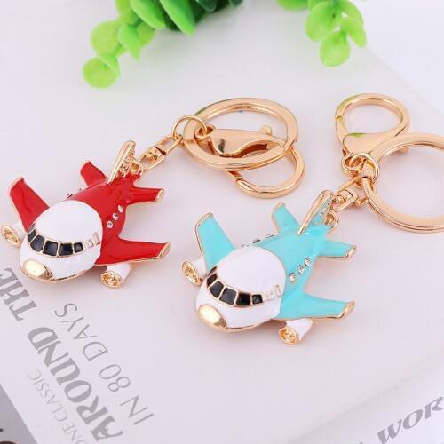Korean version of the big head helicopter aircraft shape keychain girl bag alloy keychain pendant wholesale