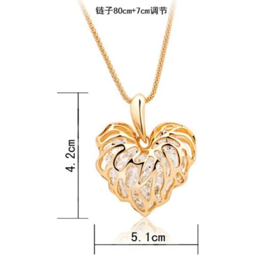 Golden Hollow love leaves built-in sparkling zircon sweater chain pendant European and American long necklace