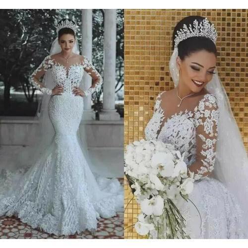 2021 New Illusion Long Sleeve Mermaid Wedding Dresses Pearls Beads Lace Sheer Neck See Through Bridal Gown Custom Made Plus Size