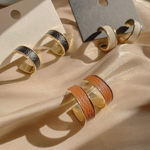 Retro French European and American ins wind circle leather earrings simple temperament c-shaped female net red tide earrings