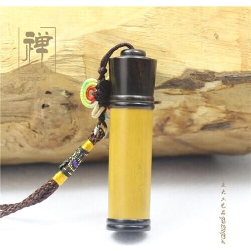 Is Takeki Aya Huang inlaid ebony bamboo powder barrel screw barrel smoke incense tube sachet Pendant