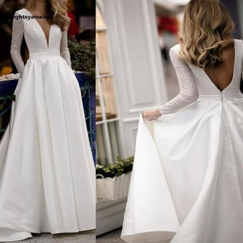 Glossy satin wedding dress ivory color V-neck open back long sleeve bridal gown pocket simple wedding bridal gownspring and fall