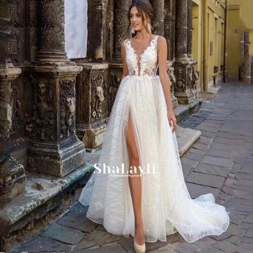 Luxury A-Line Wedding Dresses Glittering Tulle 3D Three-dimensional Applique Gowns Sleeveless Sexy High Split vestidos de novia