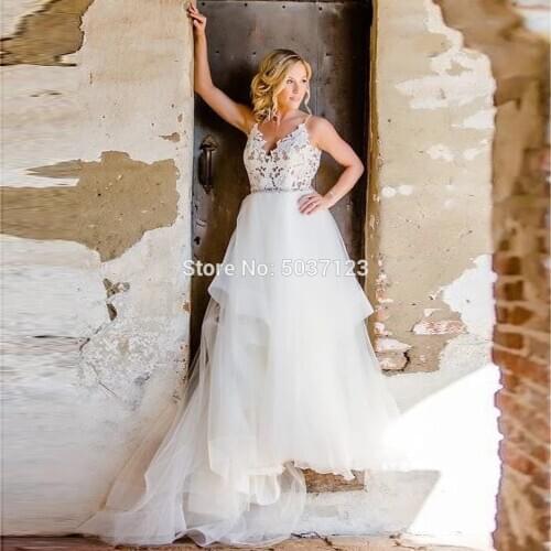 Unique Lace Appliques Ruffles Skirt Wedding Dresses 2020 Sexy Off Shoulder Straps Bridal Gowns Sleeveless Backless Wedding Dress