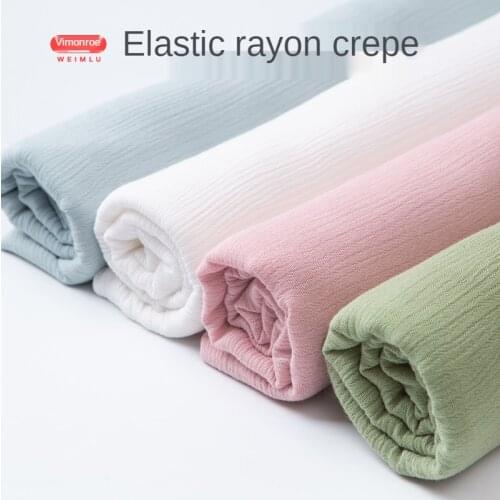 Elastic man cotton cloth solid color artificial cotton fabric summer cotton silk dress pants pajama shirt fabric sewing