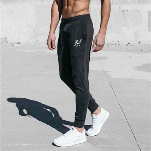 New Male Korean Version of Quick-drying Pants Mens Casual Pants Fitness Pants Running Sports Trousers Mens Slim Feet Pants