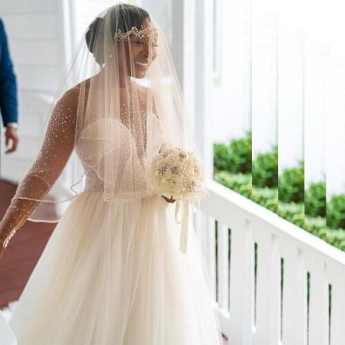 Chic Sheer Neck Long Sleeve A Line Bridal Dresses Beading Button Back Tulle Floor Length Beach Wedding Gown