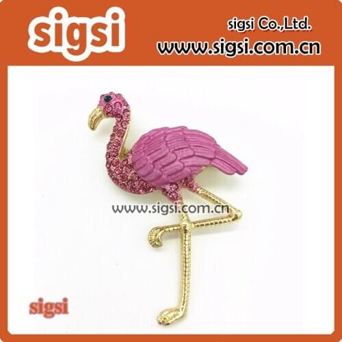 Pink rhinestone animal brooch