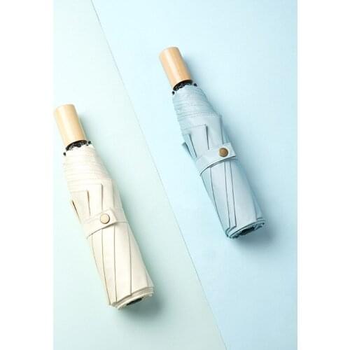 Simple retro wood handle black glue solid color sunshade three fold sunshade umbrella customized logo advertising for men and wo