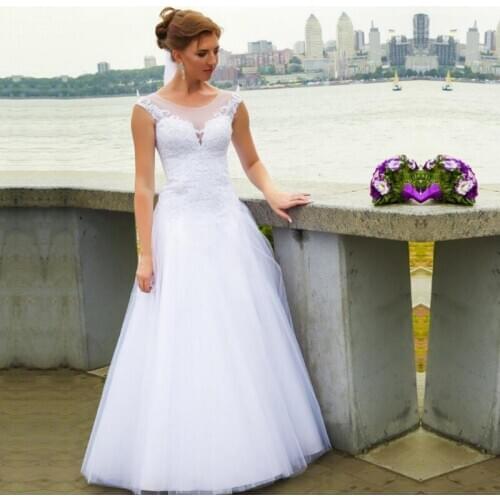 O Neck Sleeveless Wedding Dress White Ivory Vestido De Noiva Appliques Lace Lace Up Ball Dresses Floor Length Wedding Gown