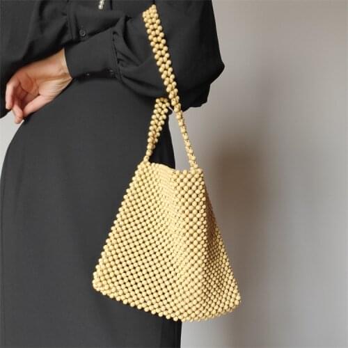 【wonder lamar】 natural wood beads weaving bag wooden bag