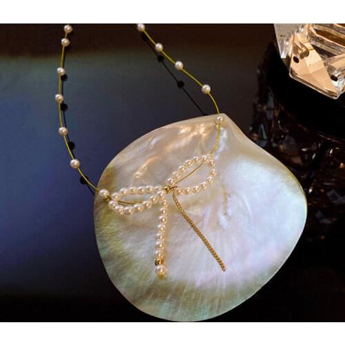 Female French Romantic Style Vintage Pearl Necklaces New Design Clavicle Chain Fashion Tassel Bowknot Pendant Prom Accessories