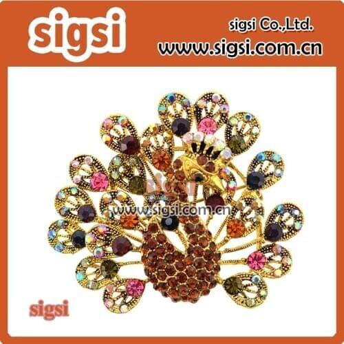 Shiny crystal rhinestone peacock brooch gold plated
