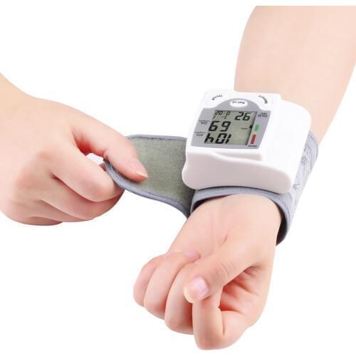 Portable Automatic Digital LCD Display Wrist Blood Pressure Monitor Device Heart Beat Rate Pulse Meter Measure Tonometer White