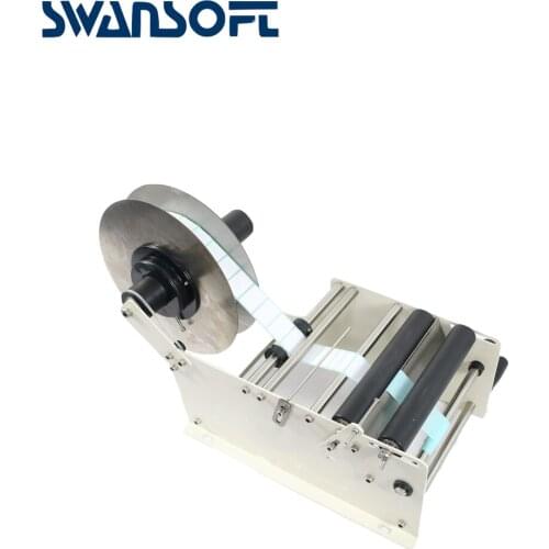 SWANSOFT Manual bottle labeling machine Holding a sticker machine ready to ship