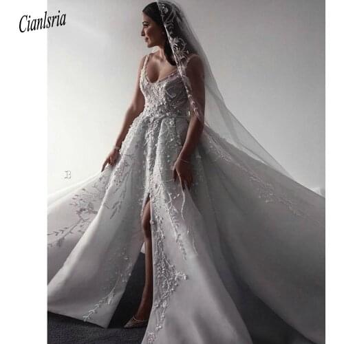 Luxury 3D Floral Appliques Spaghetti Straps Dubai A-Line Wedding Dress Sleeveless Beading Crystal High Split Arabic Bridal Gown