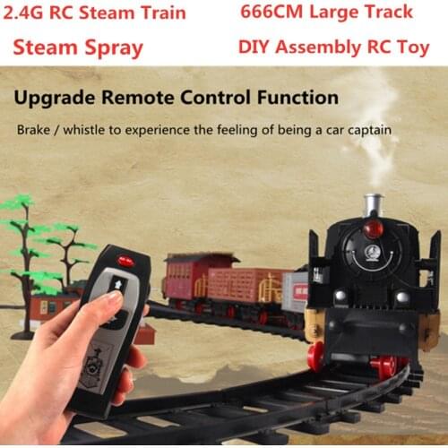 High Simulation Steam spray 2.4G RC Steam Train 666CM Large Track Railway DIY Assembly RC Toy Sound Smoking Effect Train Tracks