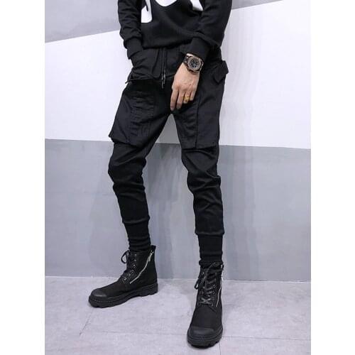 Free shipping Mens fashion black Casual unique New product big pocket overalls hair stylist element design Slim harem pants