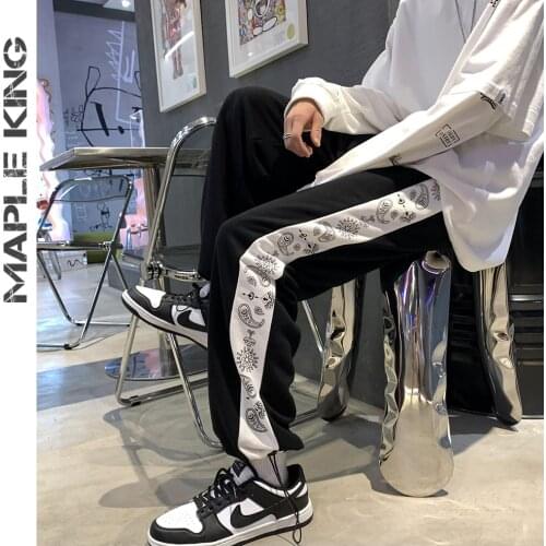 Harajuku Style Oversize Sweatpants Men High Street Printed Side Stripe Mens Jogging Pants Stretch Foot Mouth Pantalones Hombre