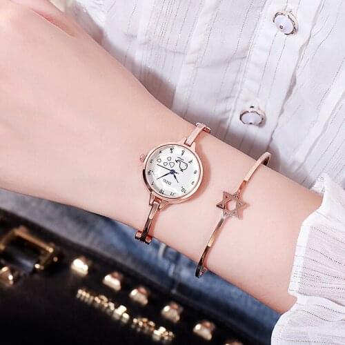 DZG temperament bracelet watch female student Korean version cute little dolphin watch quartz fashion trend ladies watch