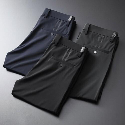 JSBDIce silk crease resistant thin casual trousers for men. Slide silk with elastic fabrics. Summer leisure slim mens trousers