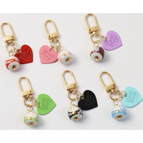 2021 Cute Ceramic Maneki Neko Lucky Cat Fortune Sweet Heart Keychain Key Chain Car For Women Bag Airpods Pendent Charms D660