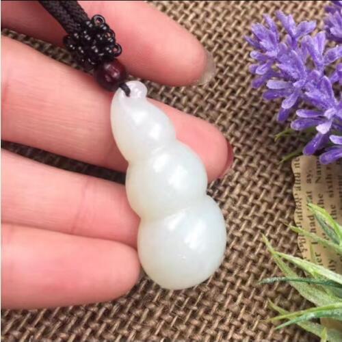 Natural Xinjiang Hetian jade white jade beans beans pendant 15 * 35mm certificate