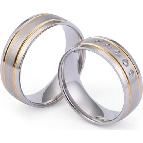Couple ring in gold color and with stainless steel frosted room