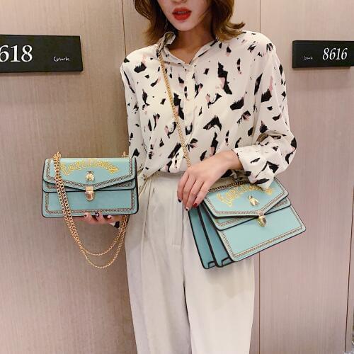 New metal chain bag solid color shoulder bag diagonal spring and summer womens handbags high capacity layered high quality PU