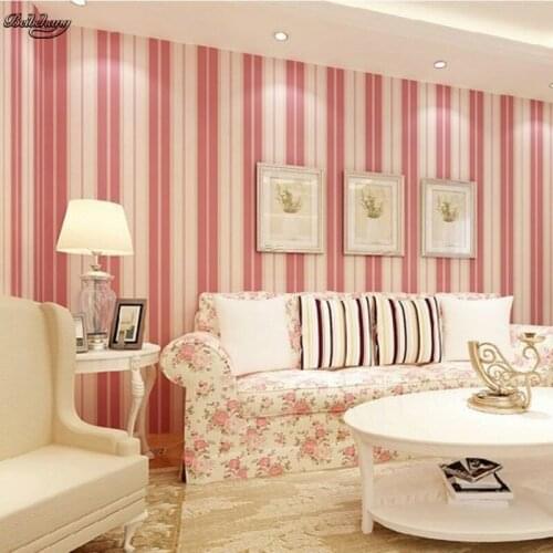 Beibehang Non-woven vertical striped wallpaper Mediterranean style blue-green yellow red pink warm living room wallpaper