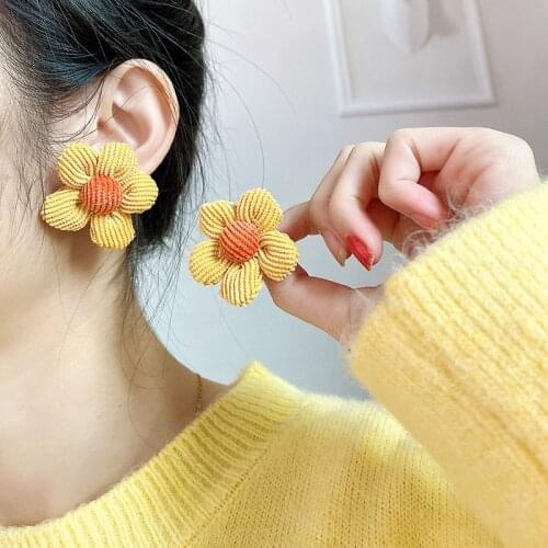 New flower earrings female super fairy design sense cute candy color earrings Korean temperament personality wild girl earrings