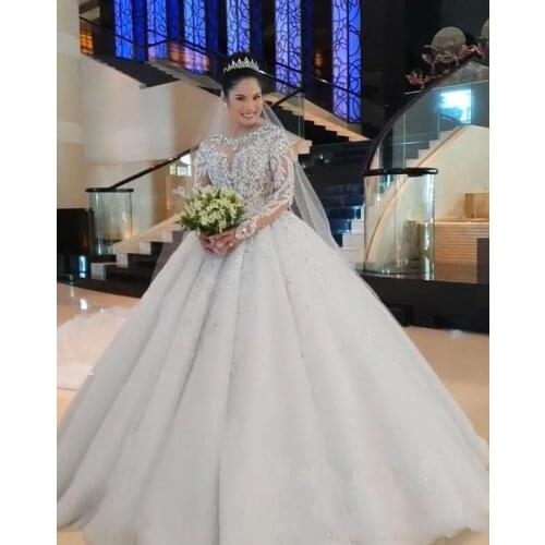 Luxury Ball Gown Wedding Dresses Long Sleeves Beaded Appliques Jewel Neck Chapel Train Weddimg Bridal Gowns Custom Made