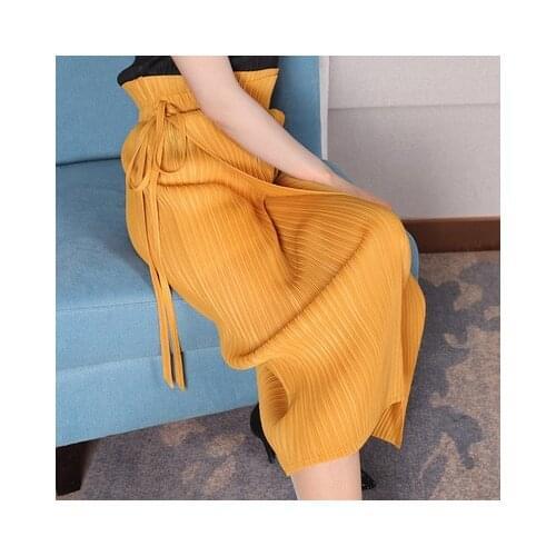 HOT SELLING Miyake fashion fold pure color twill skirt design Side split waist lacing skirt IN STOCK