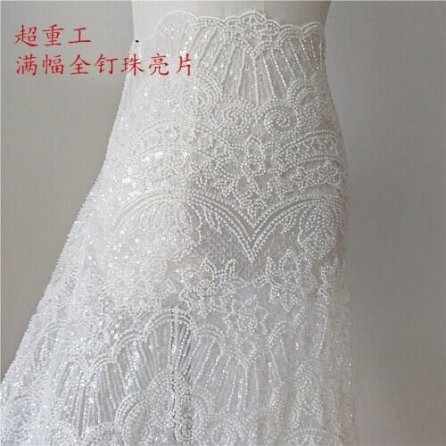 2021 new advanced heavy industry in Europe and the nail beads sequins embroidery white bud silk dress wedding dress fabrics