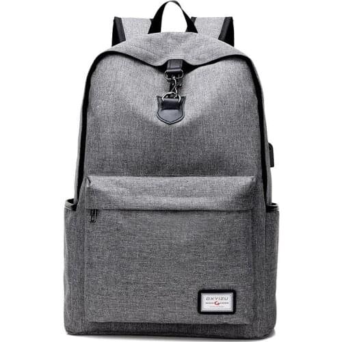 Mens backpack USB charging computer backpack Korean casual simple college style college student schoolbag travel rucksack