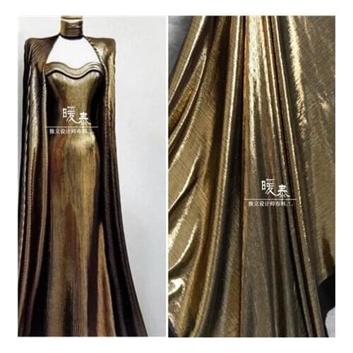 Golden metal electric light drawing micro fold soft sag elastic dress fashion background cloth design flash fabric