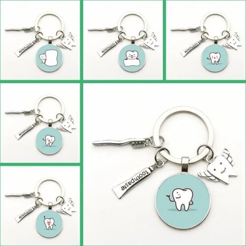 Fashion New Creative Cute Cartoon Tooth Pattern Dentist Medal Keychain Toothbrush Angel Dental Key Ring Gift Souvenir Charm Bag