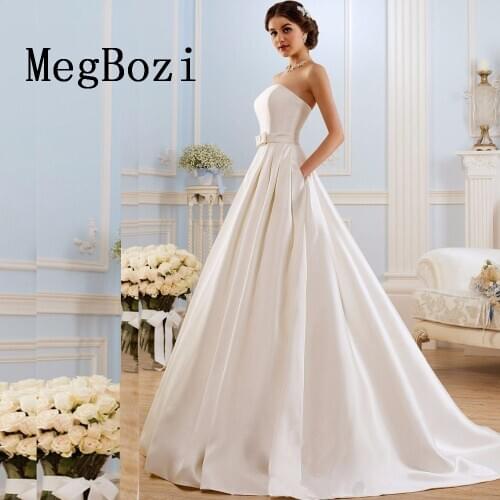 A Line Wedding Dresses Vintage Pockets Bow China Vestidos De Novia Backless Plus Size Button Bride Bridal Gowns 2021