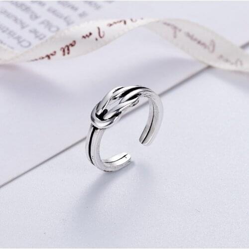 Japanese and Korean version of retro bow love ring female Thai silver open index finger ring to make old simple ornaments