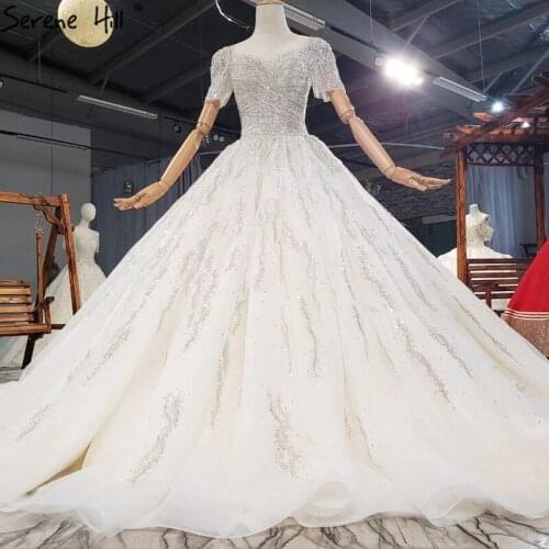 Dubai Ivory Luxury Short Sleeves Wedding Dresses 2021 O-Neck High-end Beading Sexy Bridal Gowns HX0283 Custom Made