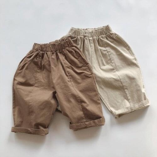 Korean childrens spring and autumn clothes new childrens crimping casual pants solid color woven pants