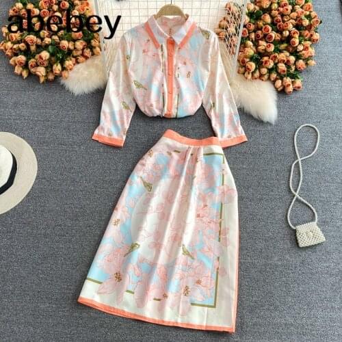 2021 New Autumn Fashion turn-down collar long sleeve single breasted print Top + high waist mid-length A-line Skirt 2-piece set