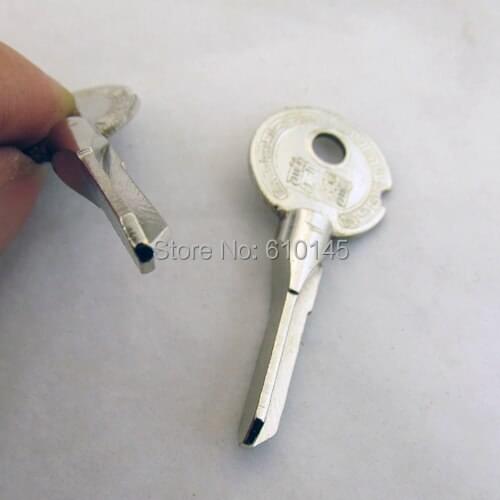Cross blank key