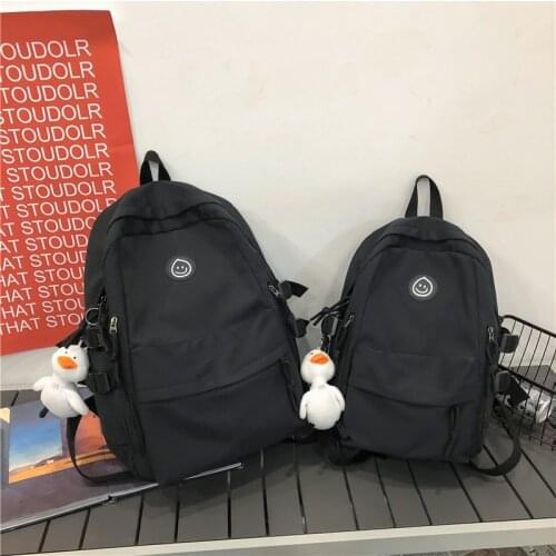 2021 new Korean high-capacity couple backpack mens and womens universal style fashionable junior high school schoolbag