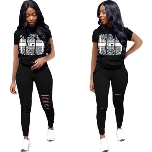 2021 New Arrival Famous Brand 2 pcs Tracksuits Women Set Print O-neck Short Sleeve Tops Long Pants Casual Elastic Outfits