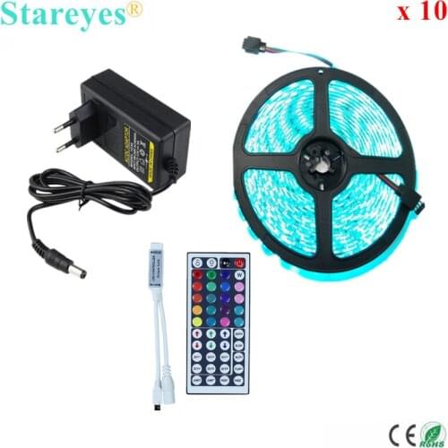 Free Shipping 10 Sets SMD 5050 60 LED/M RGB LED Strip 5M 300LED IP65 Waterproof strip light + 44 Key IR Remote+5A Power Adapter
