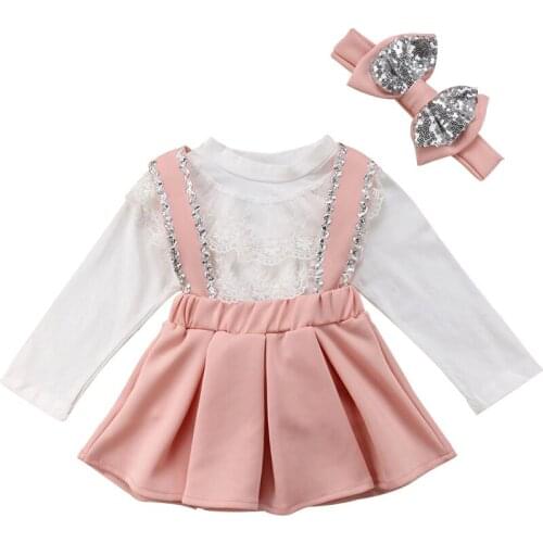 Baby girl clothes spring and autumn new strap skirt suit girl lace long-sleeved top + strap bow skirt baby girl two-piece suit