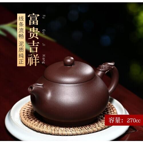 Recommended and pure manual kung fu tea set undressed ore purple clay teapot with a silver spoon in her mouth lucky pot