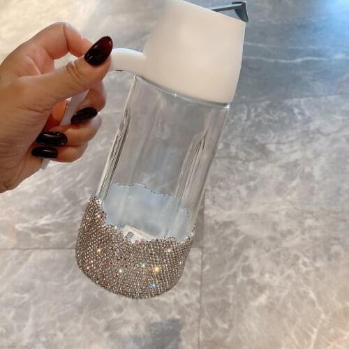 Household glass olive oil bottle automatic opening and closing seasoning container barbecue kitchen edible oil pot with cover